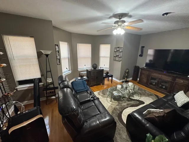 a bedroom with bed and window