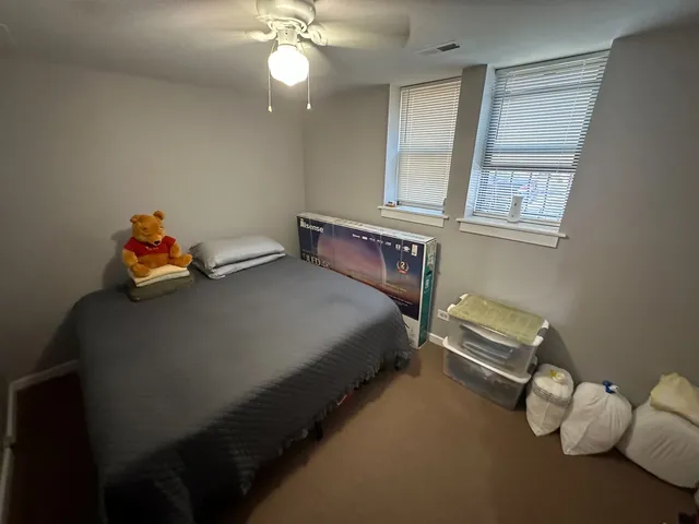 a living room with furniture fireplace and a flat screen tv