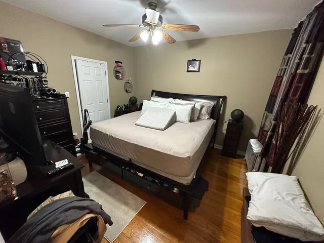 a view of a entryway door with wooden floor