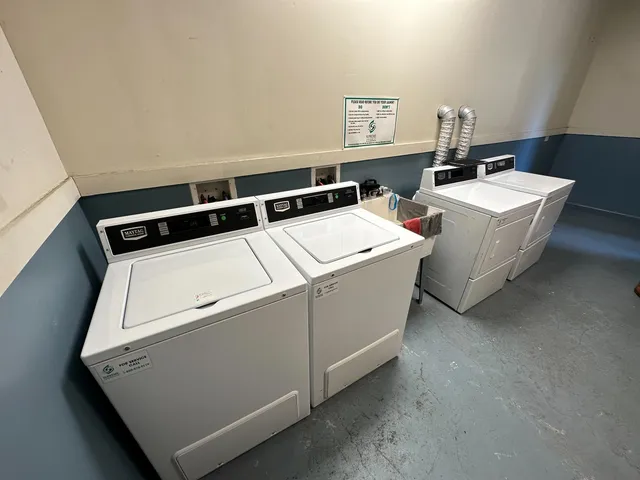 a view of a chairs and table on the deck