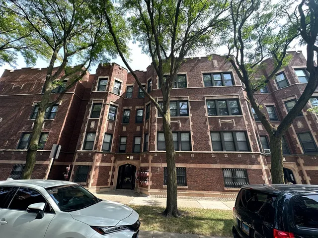 a car parked in front of a building
