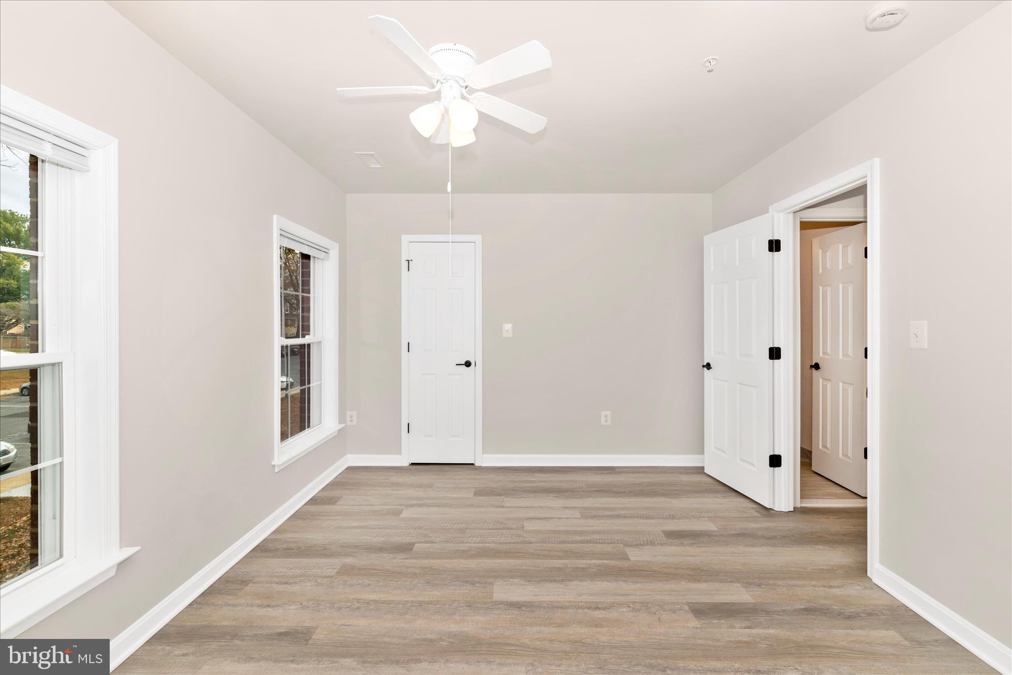 828 Quince Orchard Boulevard, Unit 82820 Gaithersburg, MD 20878 - Photo 37 of 51 a view of an empty room with a window