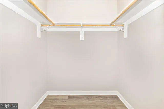 a view of a room with racks on the wall