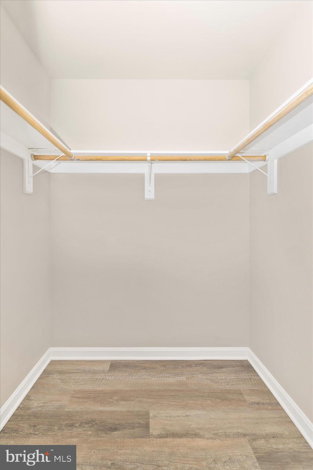 828 Quince Orchard Boulevard, Unit 82820 Gaithersburg, MD 20878 - Photo 40 of 51 a view of a room with racks on the wall