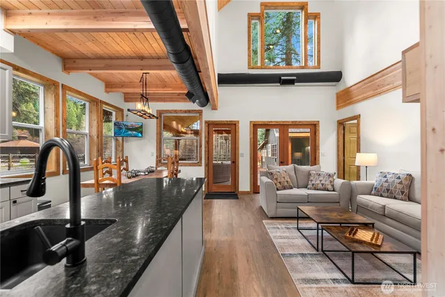 a lobby with furniture and rug