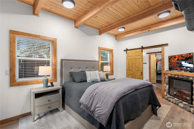 a bed room with a bed and a dresser