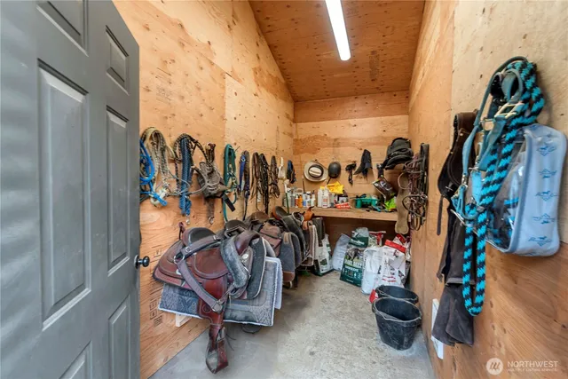 a view of a house with a yard and garage
