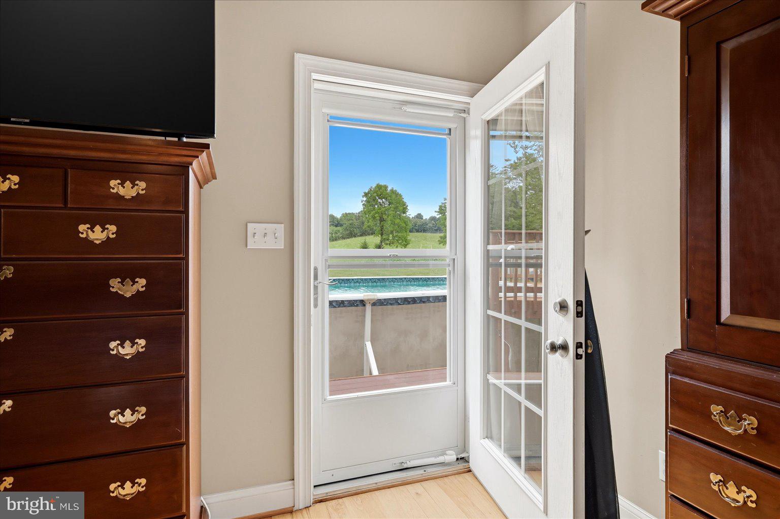 6264 Middle Road Stephens City, VA 22655 - Photo 32 of 73 Door from Primary Bedroom to sie deck