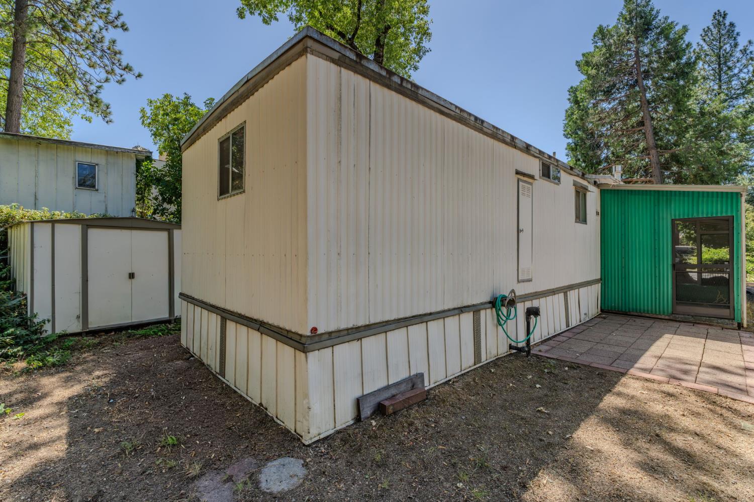 1281 Pleasant Valley Road, Unit 28 Diamond Springs, CA 95619 - Photo 28 of 36 REAR OF HOME WITH SHED