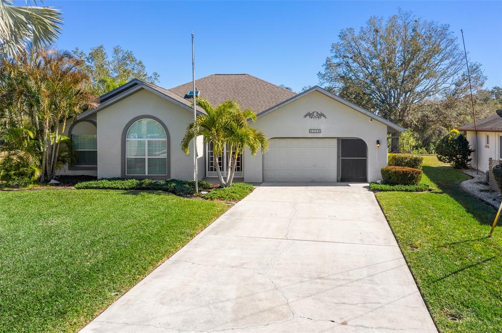 2214 Mauritania Road Punta Gorda, FL 33983 - Photo 1 of 1 a front view of a house with garden
