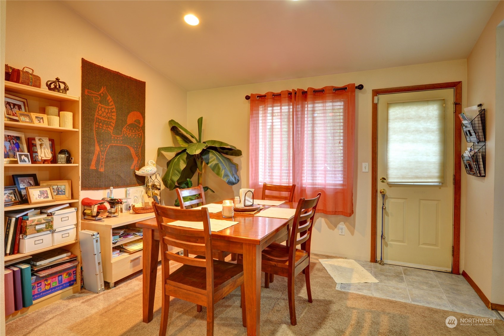 21405 Calhoun Road Monroe, WA 98272 - Photo 13 of 36 a view of a dining room with furniture and a window