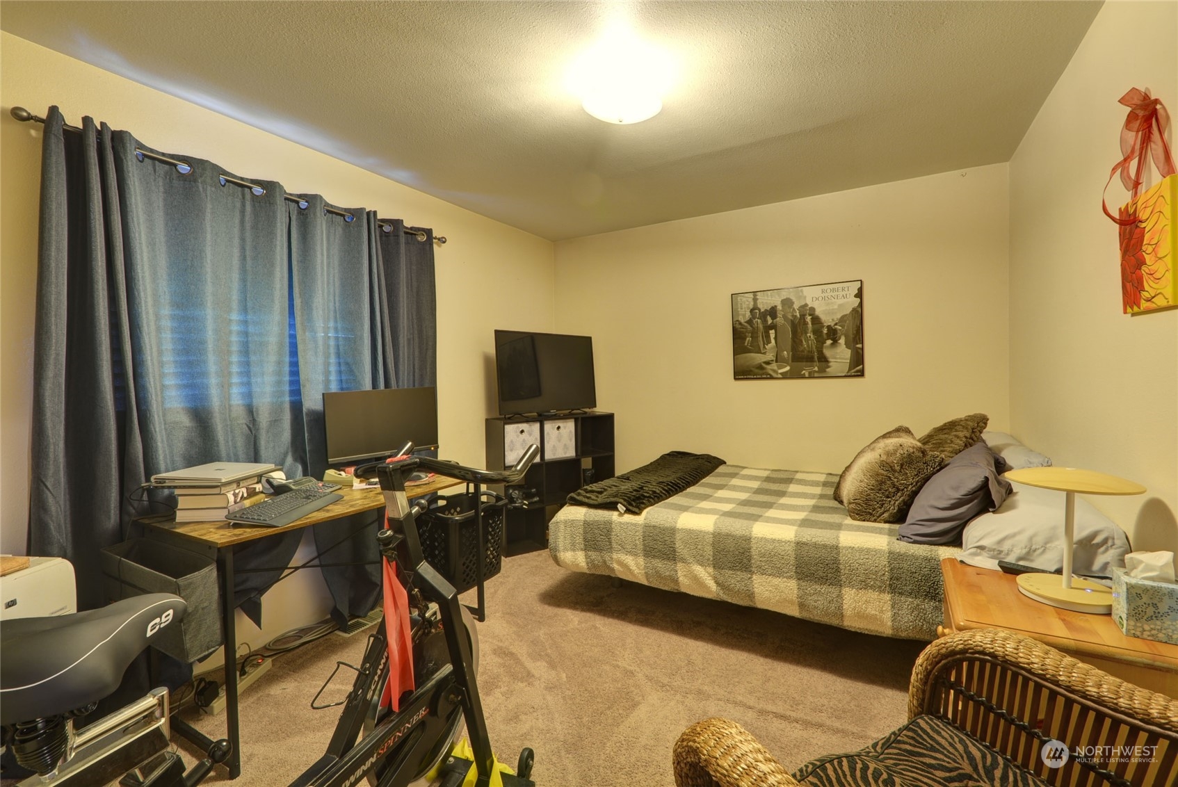 21405 Calhoun Road Monroe, WA 98272 - Photo 18 of 36 a bedroom with a bed and wooden floor