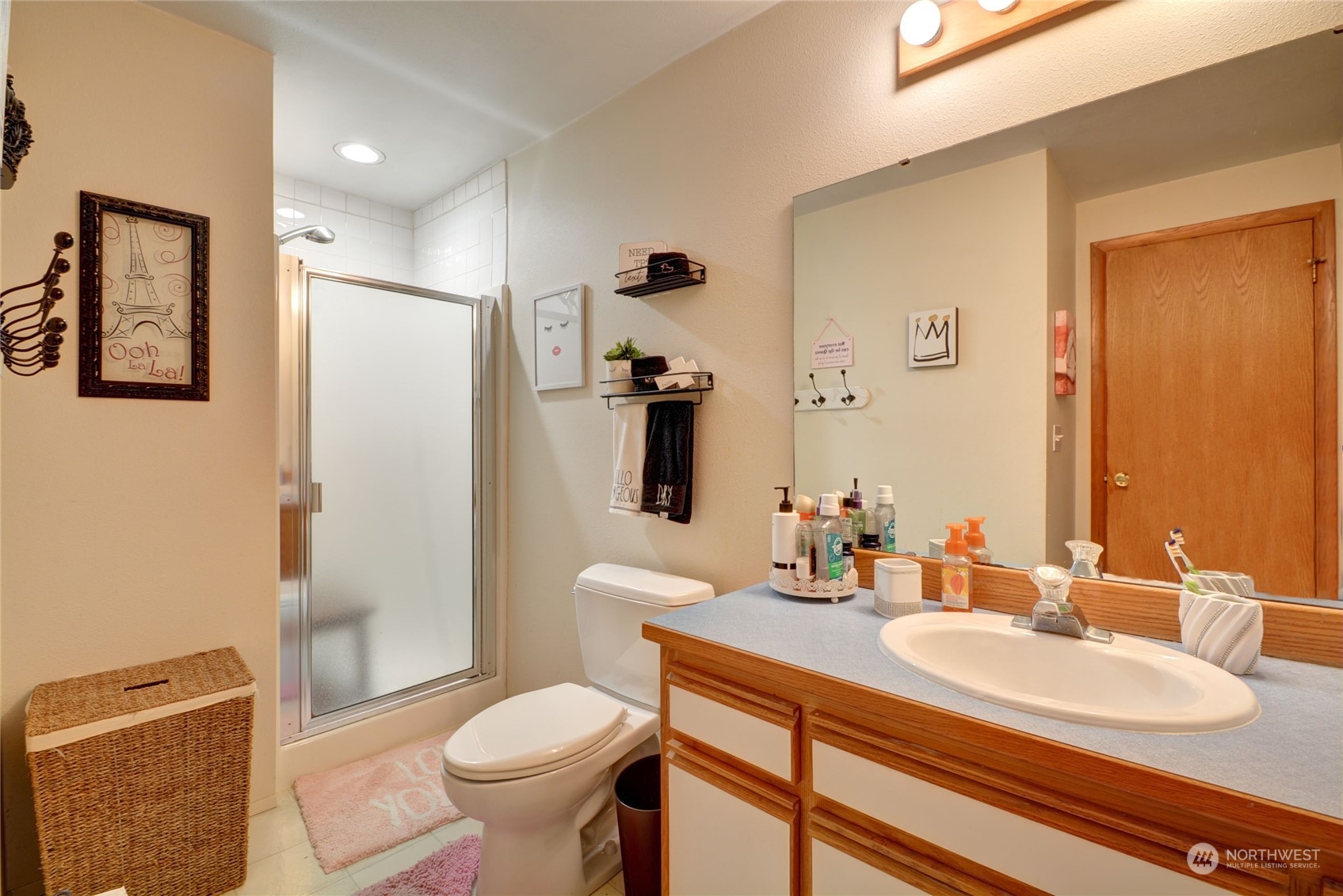 21405 Calhoun Road Monroe, WA 98272 - Photo 20 of 36 a bathroom with a sink toilet and shower