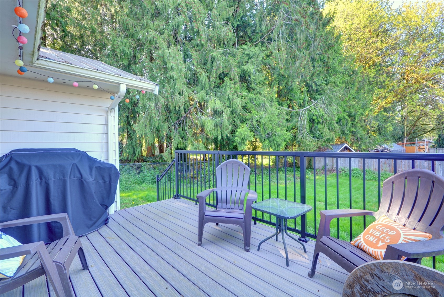 21405 Calhoun Road Monroe, WA 98272 - Photo 21 of 36 a view of a deck with furniture and a backyard