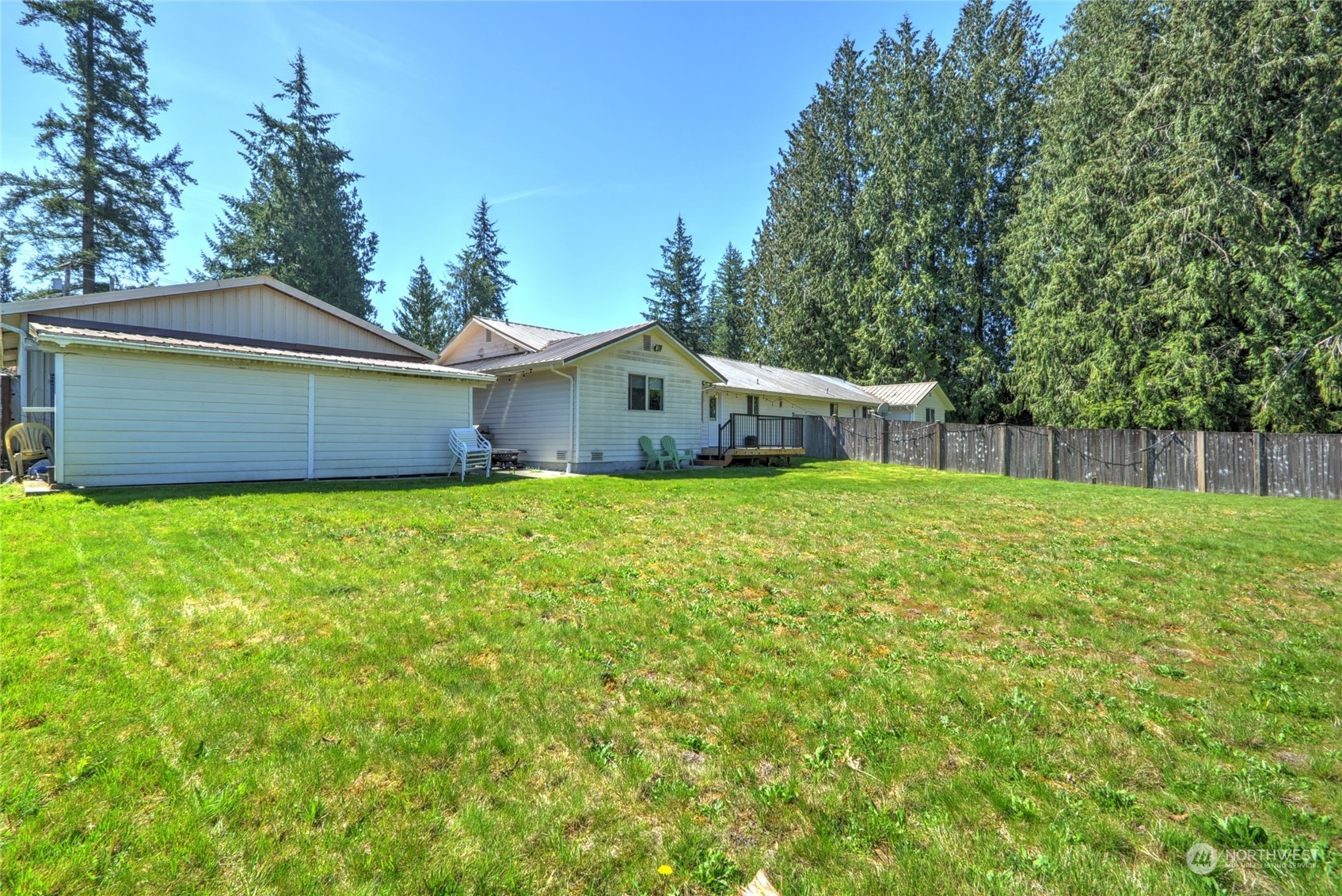 21405 Calhoun Road Monroe, WA 98272 - Photo 22 of 36 a house view with a garden space