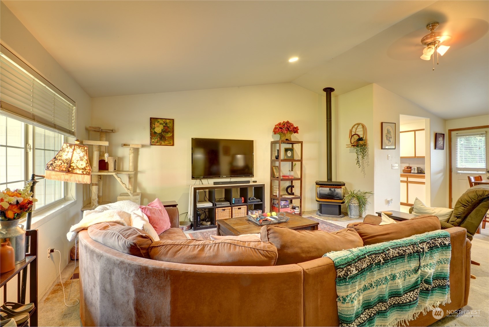 21405 Calhoun Road Monroe, WA 98272 - Photo 23 of 36 a living room with furniture and a flat screen tv