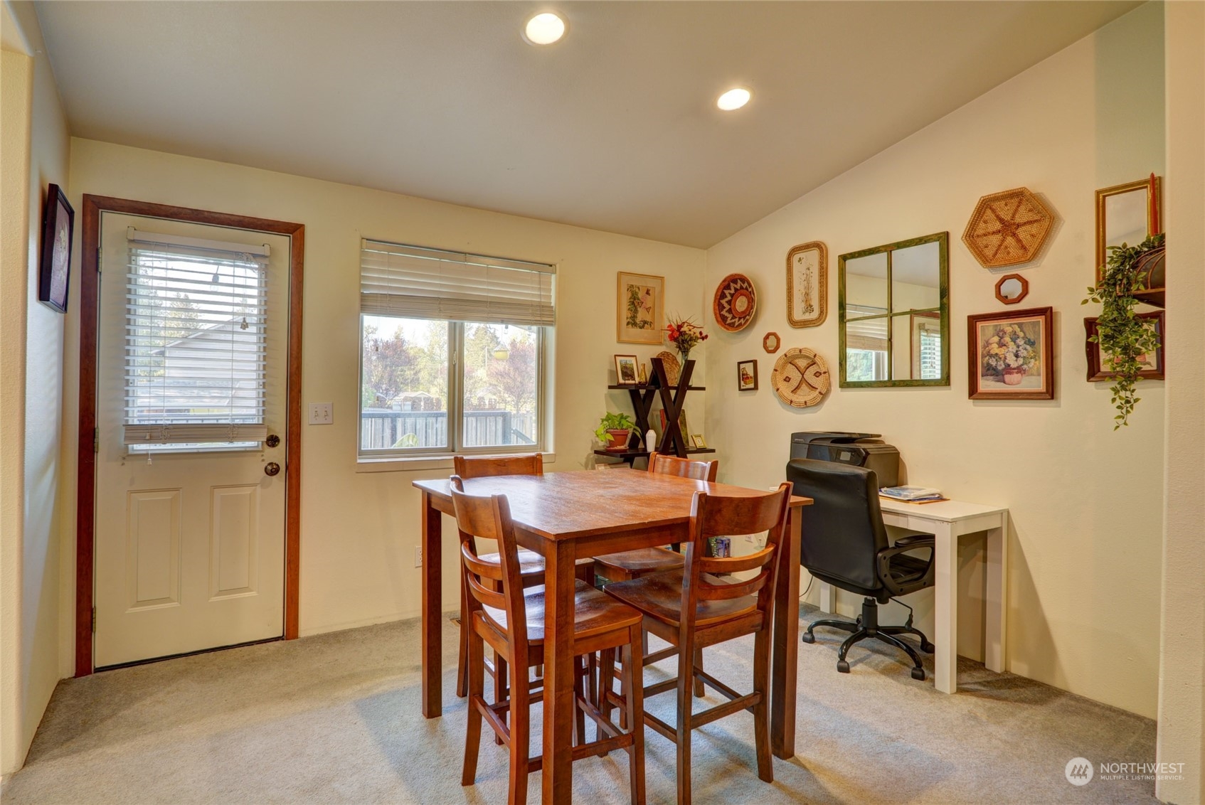 21405 Calhoun Road Monroe, WA 98272 - Photo 24 of 36 a view of a dining room with furniture and a window