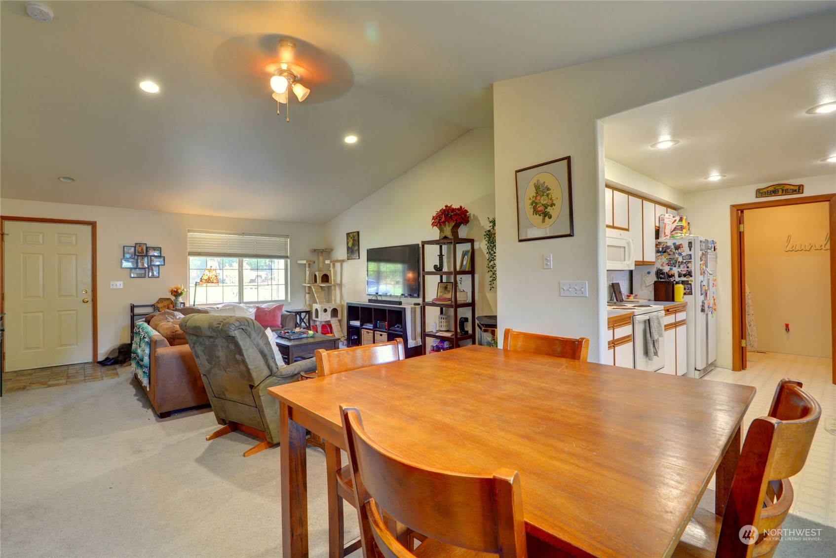 21405 Calhoun Road Monroe, WA 98272 - Photo 25 of 36 a view of a dining room with furniture