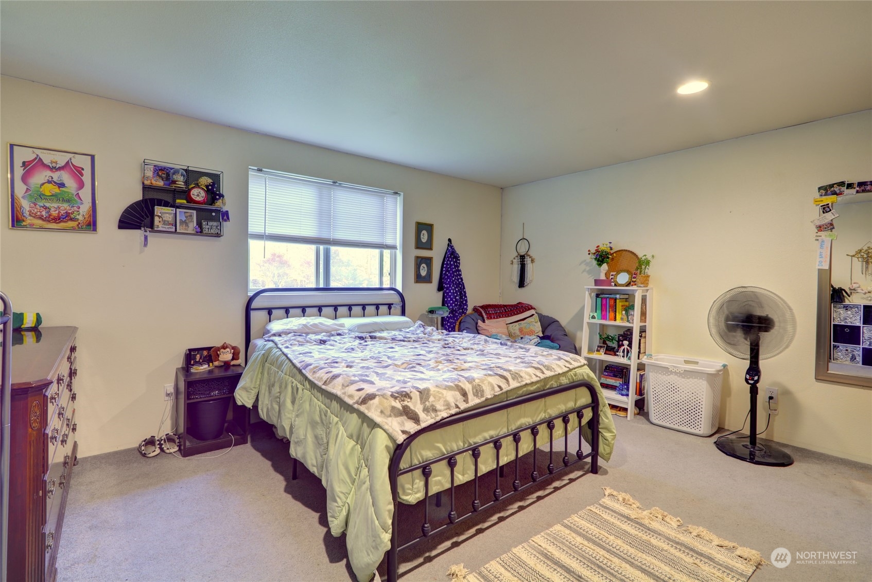 21405 Calhoun Road Monroe, WA 98272 - Photo 29 of 36 a bedroom with a bed and a table in it