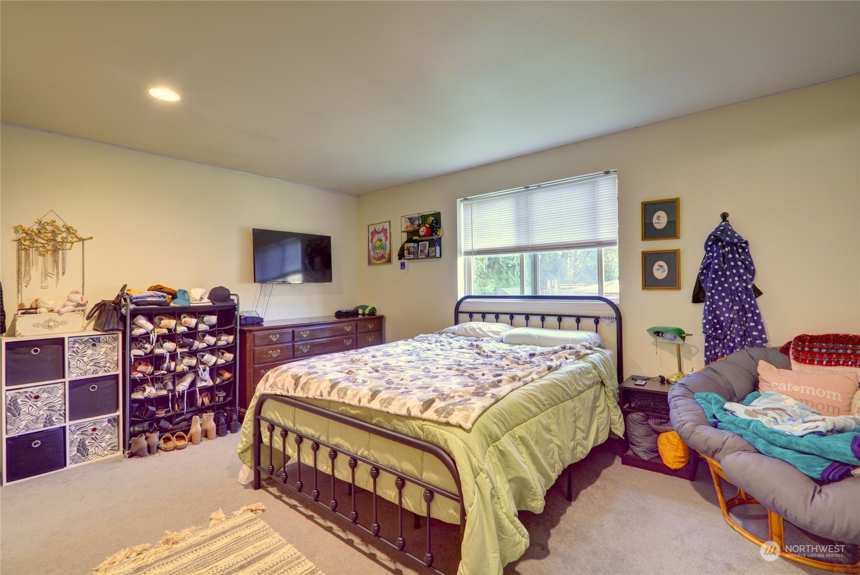 21405 Calhoun Road Monroe, WA 98272 - Photo 30 of 36 a bedroom with a bed table closet and a window