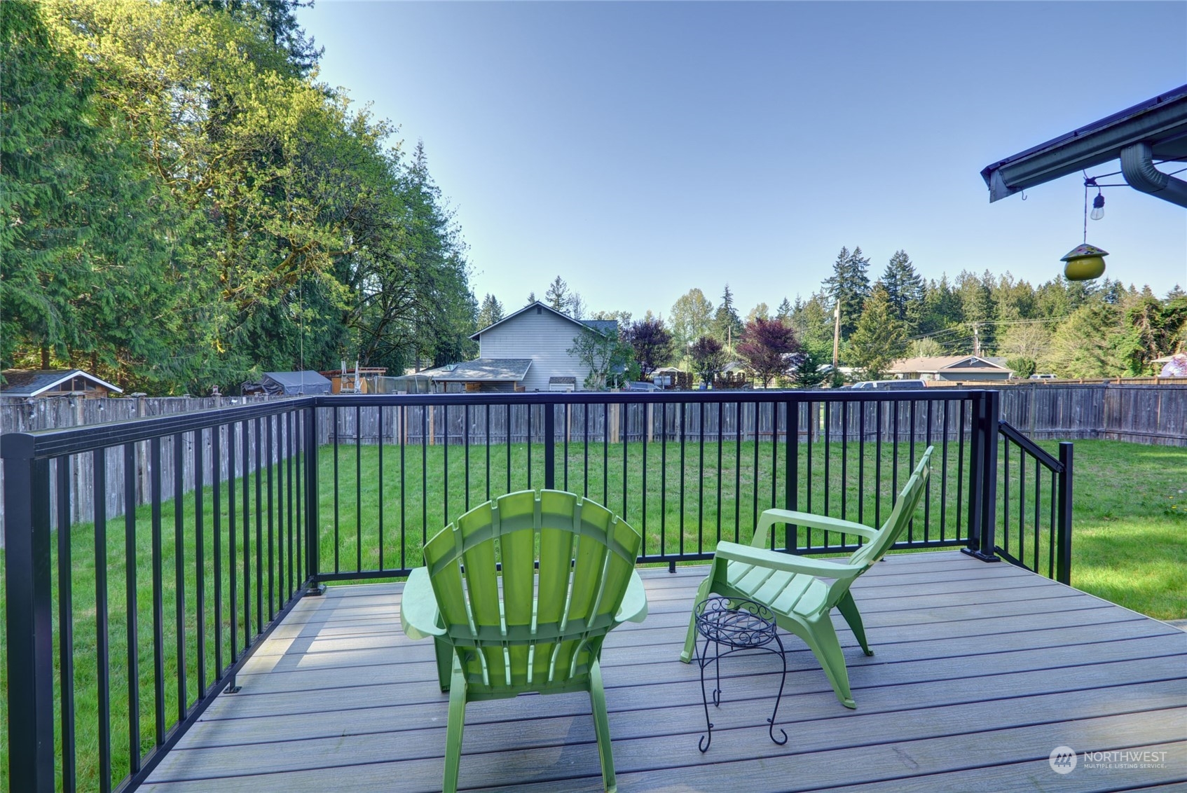 21405 Calhoun Road Monroe, WA 98272 - Photo 36 of 36 a view of a deck with a chair