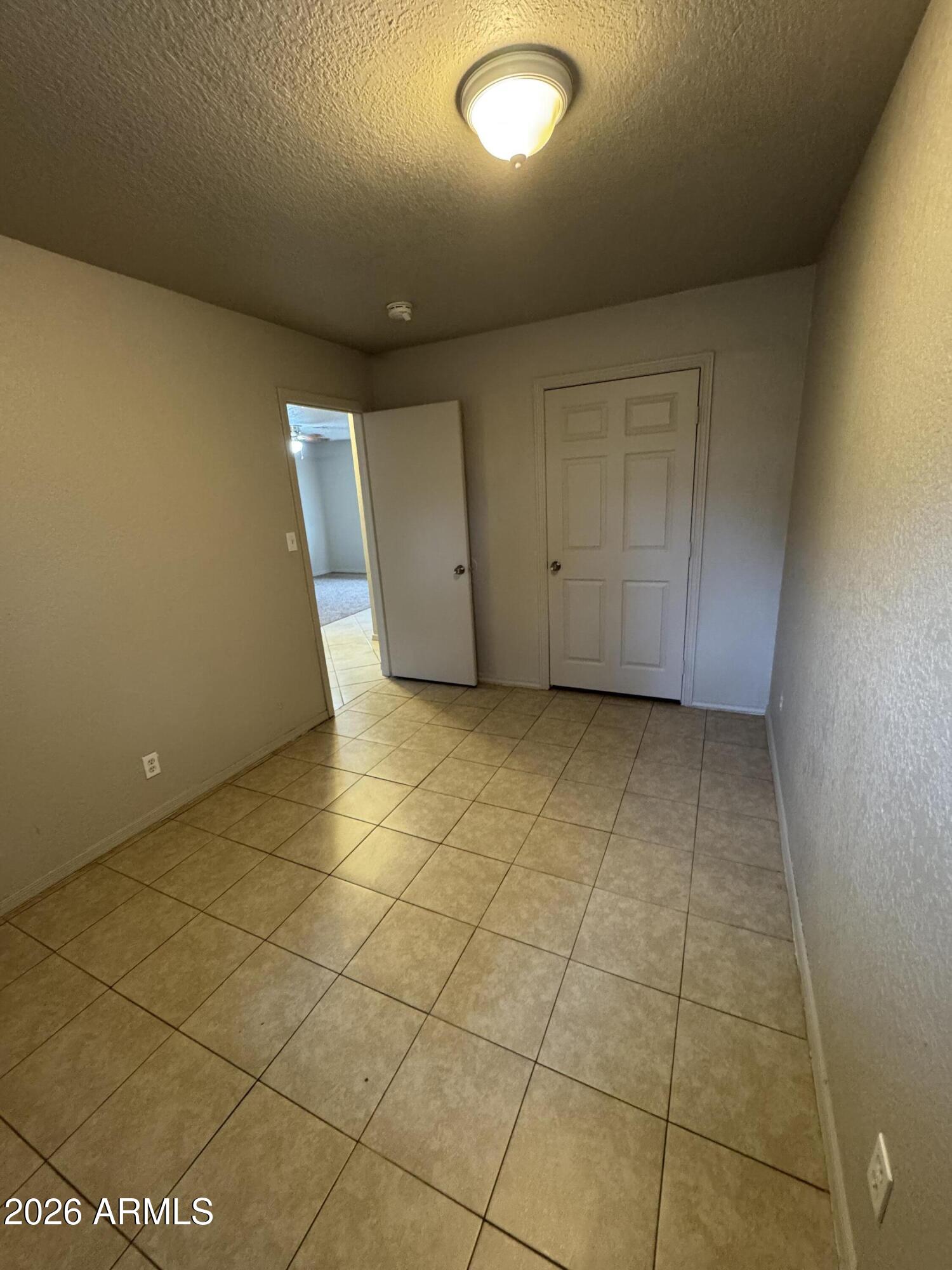 1702 West Shangri-la Road Phoenix, AZ 85029 - Photo 17 of 25 a view of an empty room