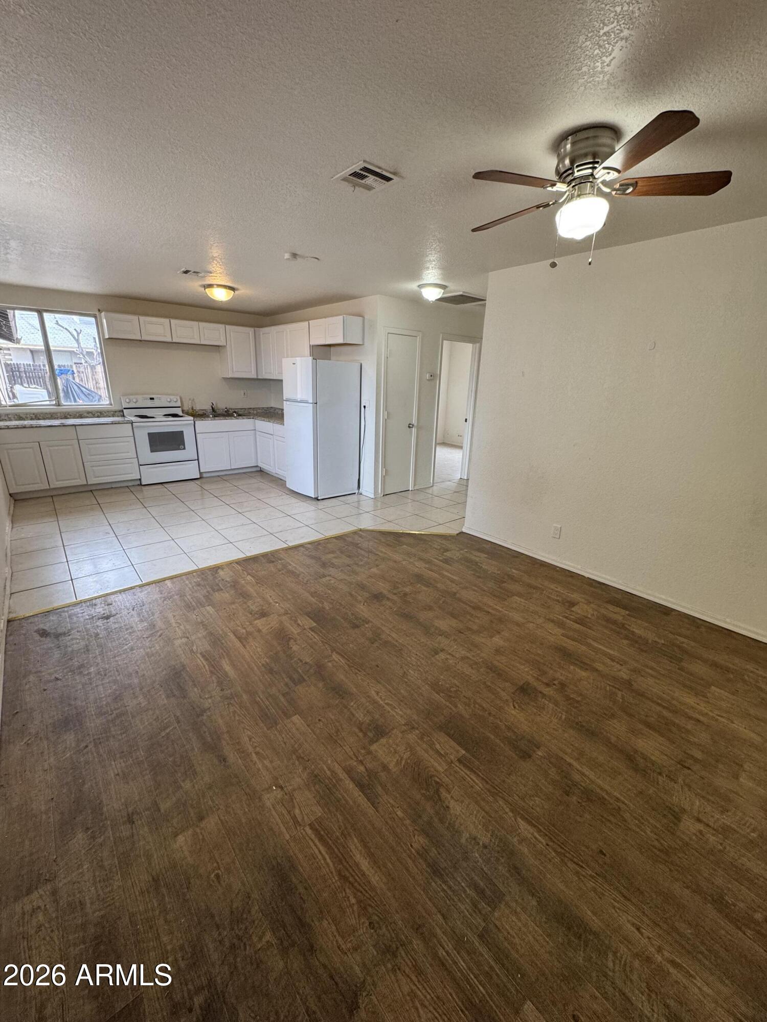 1702 West Shangri-la Road Phoenix, AZ 85029 - Photo 19 of 25 a view of an empty room with a window
