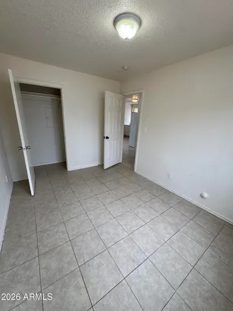 an empty room with a fireplace