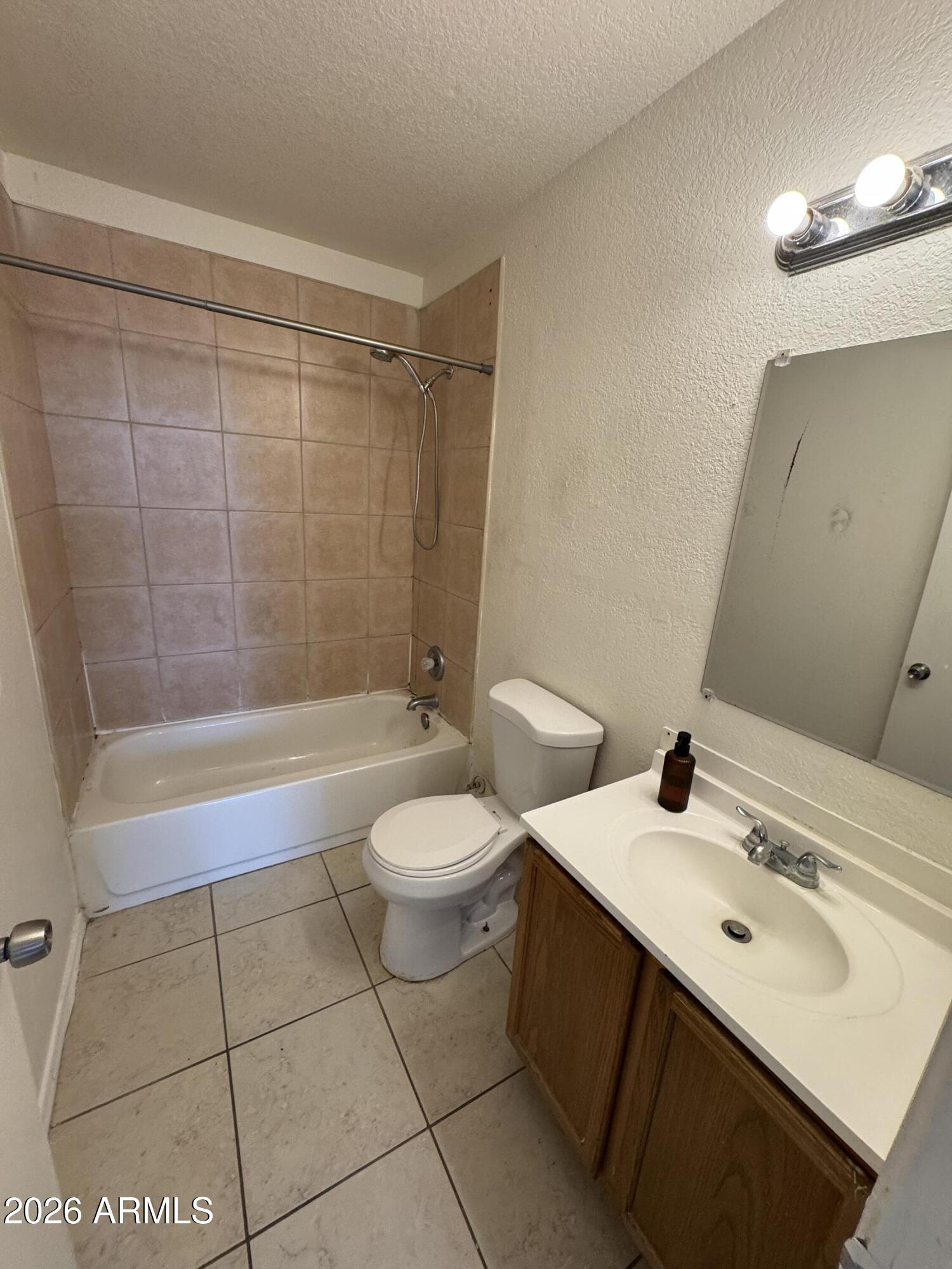 1702 West Shangri-la Road Phoenix, AZ 85029 - Photo 22 of 25 a bathroom with a sink a toilet and shower