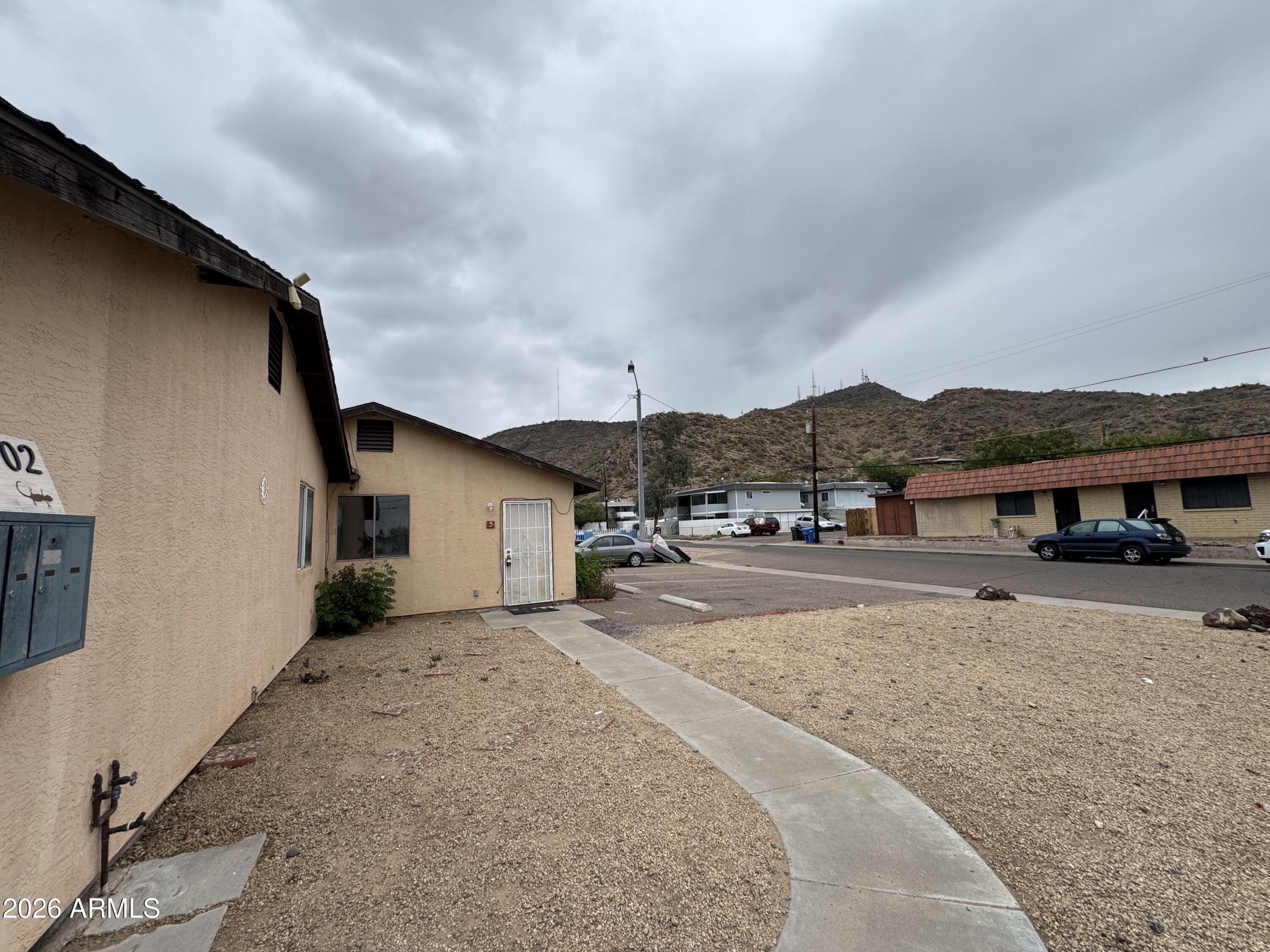 1702 West Shangri-la Road Phoenix, AZ 85029 - Photo 4 of 25 a view of a house with a patio