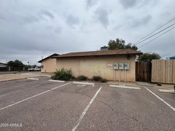 a view of a house with a street