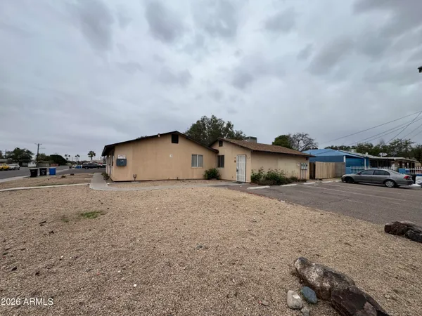 a big house with a big yard and large parking space