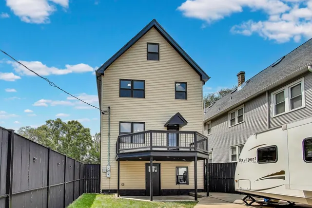 a view of a house with a garage