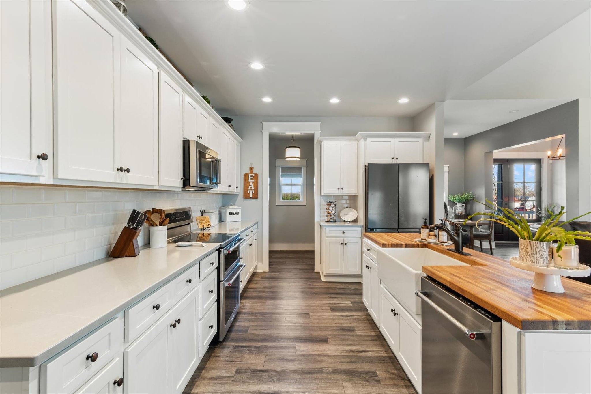 2114 Longview Road Rockvale, TN 37153 - Photo 26 of 48 a large kitchen with stainless steel appliances granite countertop a lot of counter space and wooden floors
