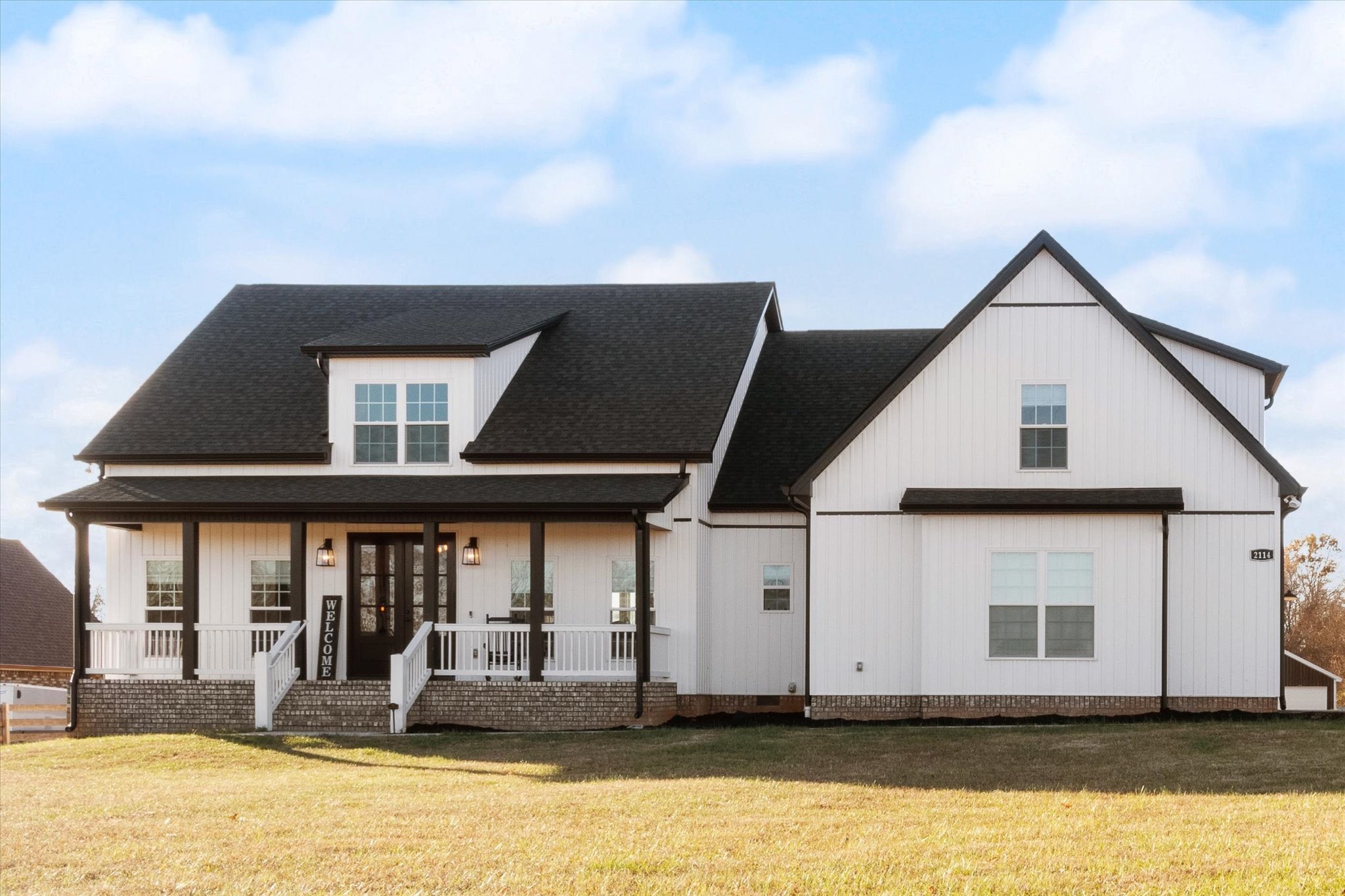 2114 Longview Road Rockvale, TN 37153 - Photo 3 of 48 a view of a house with large windows and yard