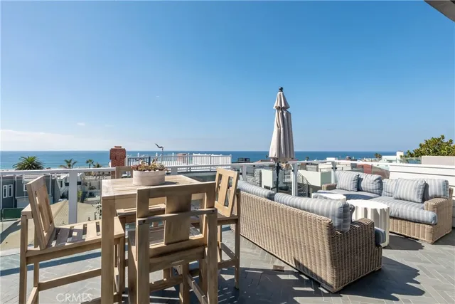a view of a terrace with seating area