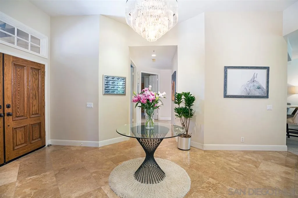 14150 Steeple Chase Row San Diego, CA 92130 - Photo 14 of 25 a glass vase with flowers on a table