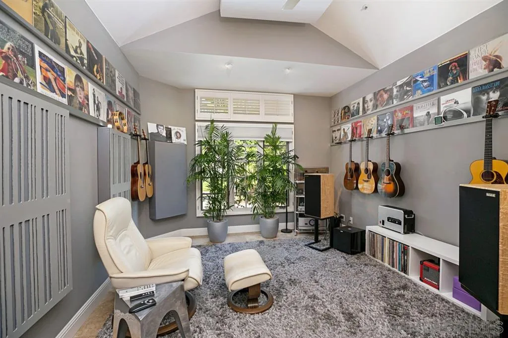 14150 Steeple Chase Row San Diego, CA 92130 - Photo 21 of 25 a living room with furniture and a window