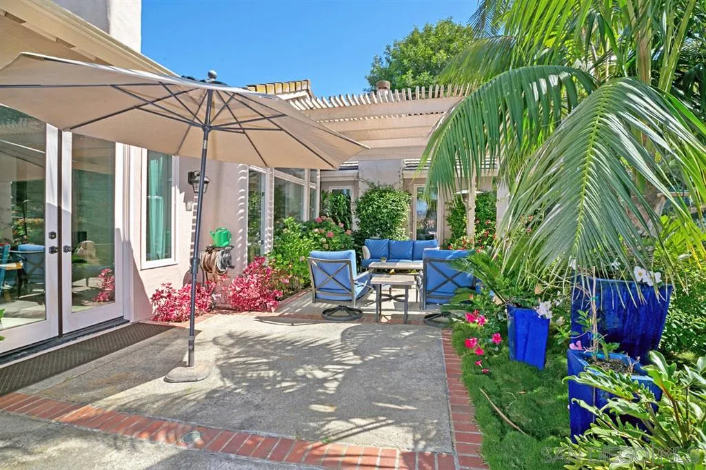 14150 Steeple Chase Row San Diego, CA 92130 - Photo 25 of 25 a garden view with a seating space