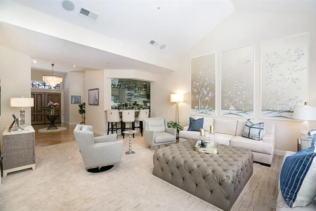 14150 Steeple Chase Row San Diego, CA 92130 - Photo 4 of 25 a living room with furniture and a large window