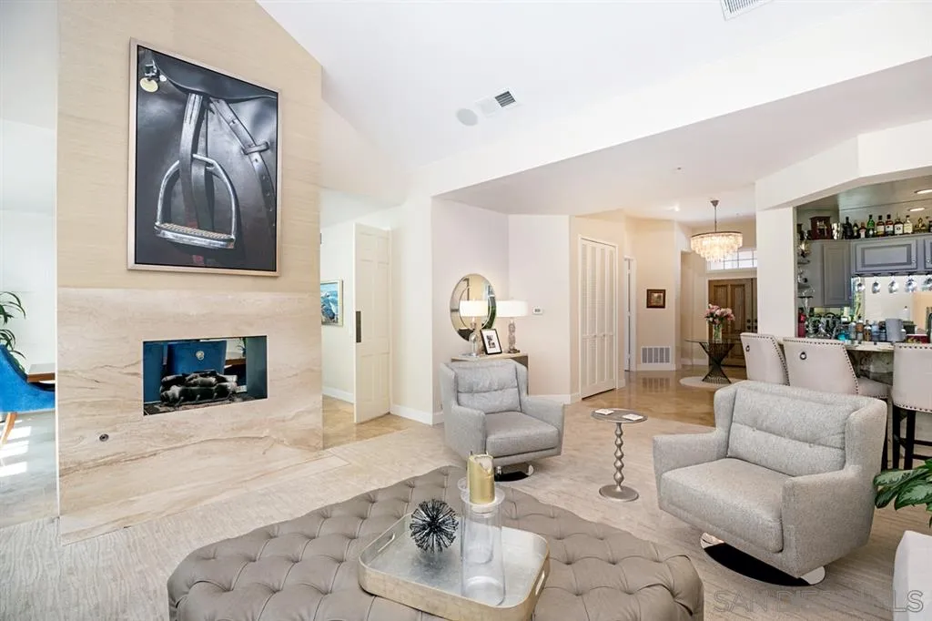 14150 Steeple Chase Row San Diego, CA 92130 - Photo 5 of 25 a living room with furniture and a fireplace