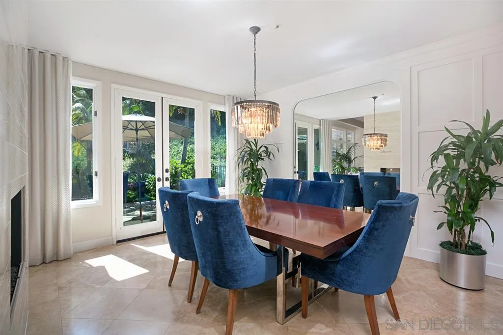14150 Steeple Chase Row San Diego, CA 92130 - Photo 7 of 25 a view of a dining room with furniture window and wooden floor