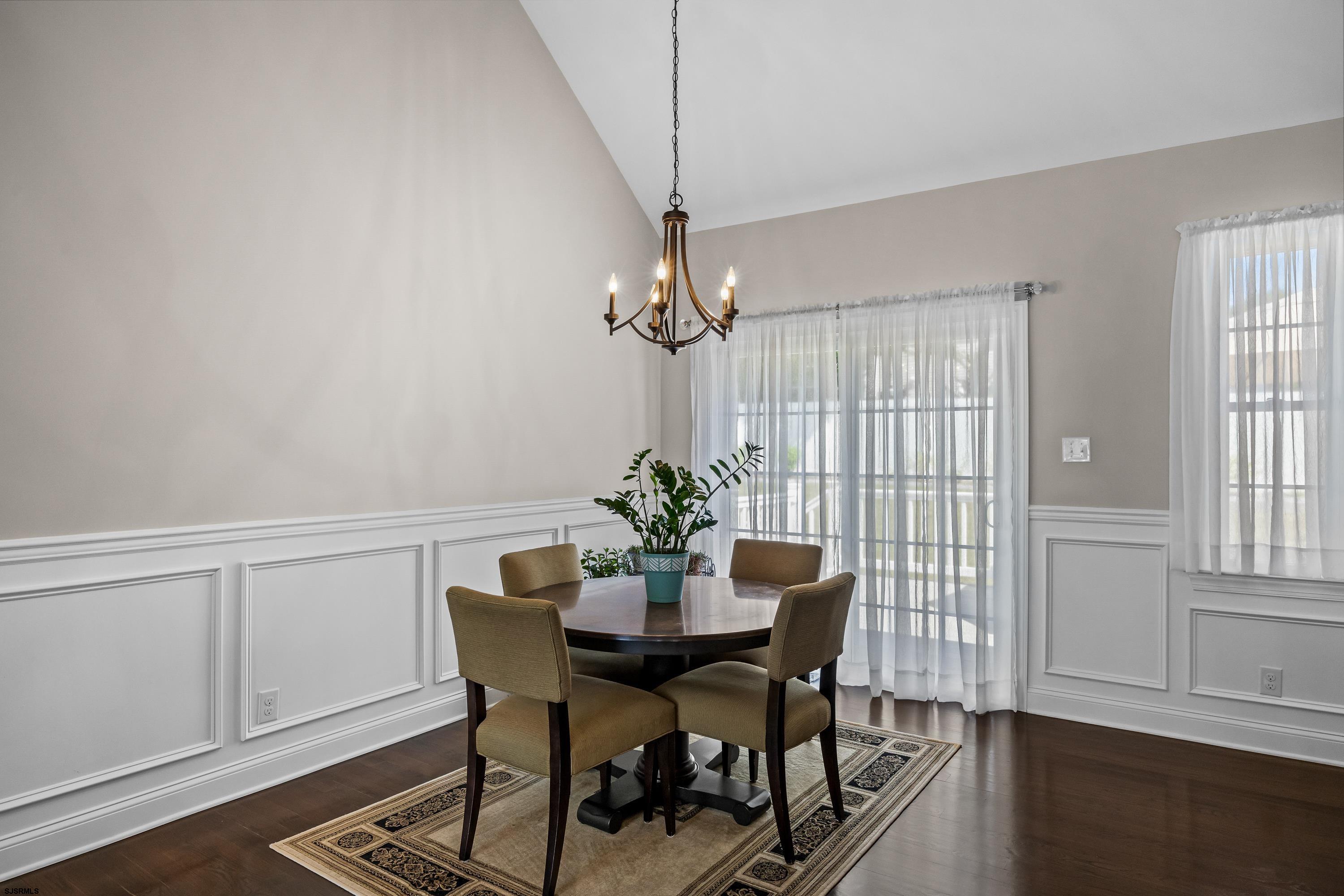 215 Surf Road Egg Harbor Township, NJ 08234 - Photo 9 of 31 a view of a dining room with furniture and window