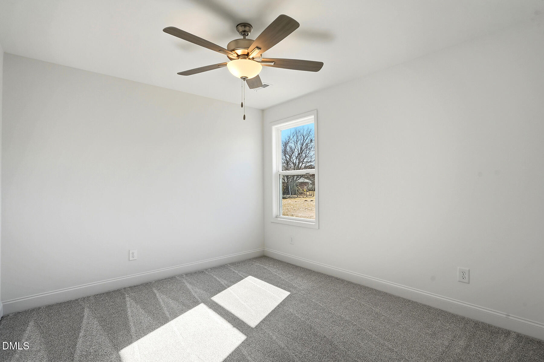 236 Rae Street Warsaw, NC 28398 - Photo 15 of 29 an empty room with a window