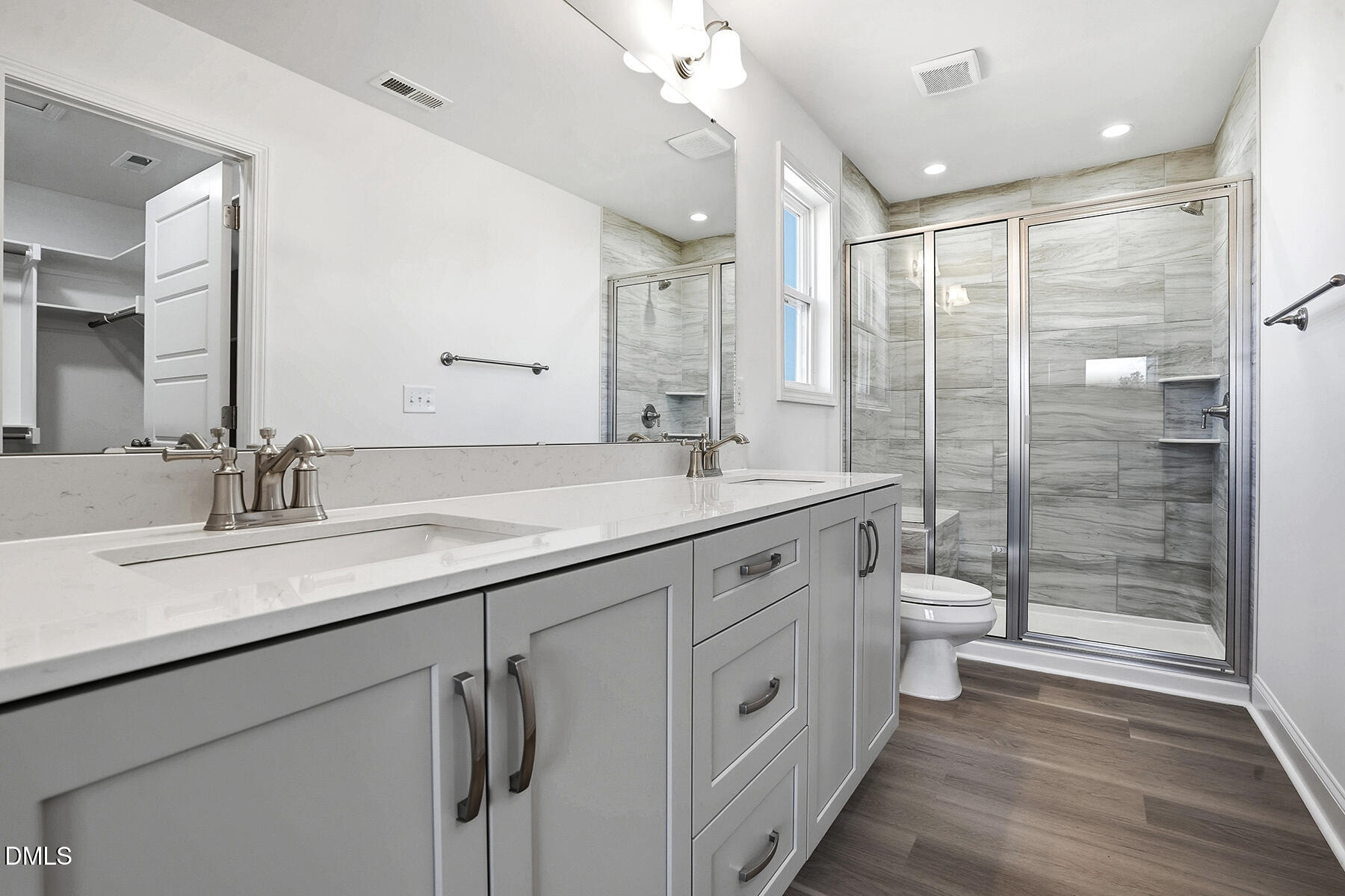 236 Rae Street Warsaw, NC 28398 - Photo 21 of 29 a bathroom with a double vanity sink toilet mirror and shower