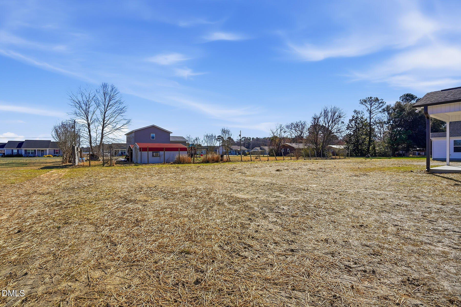 236 Rae Street Warsaw, NC 28398 - Photo 26 of 29 a view of an ocean with a building in the background