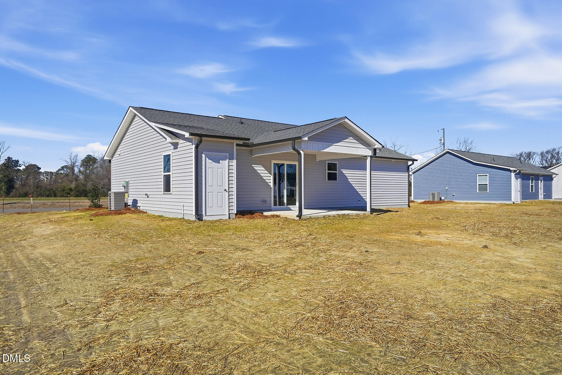 236 Rae Street Warsaw, NC 28398 - Photo 28 of 29 a front view of house with yard and garage
