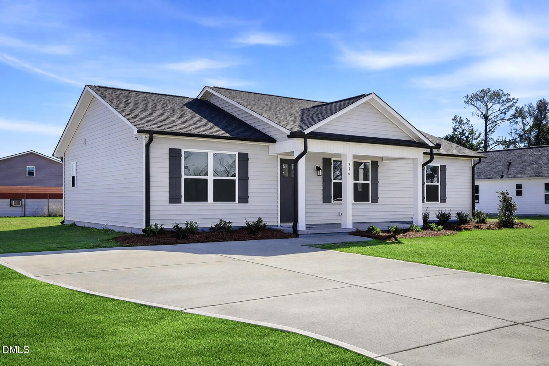 236 Rae Street Warsaw, NC 28398 - Photo 3 of 29 a front view of a house with a yard