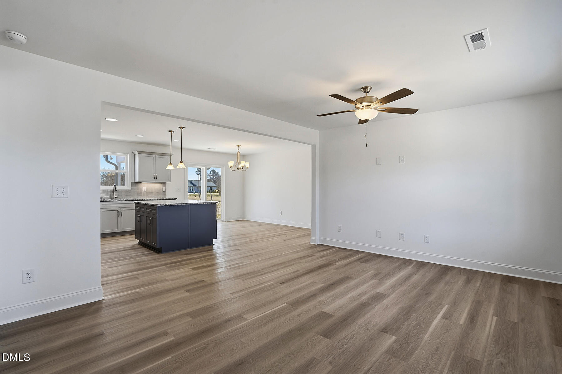 236 Rae Street Warsaw, NC 28398 - Photo 5 of 29 a view of kitchen with sink and wooden floor