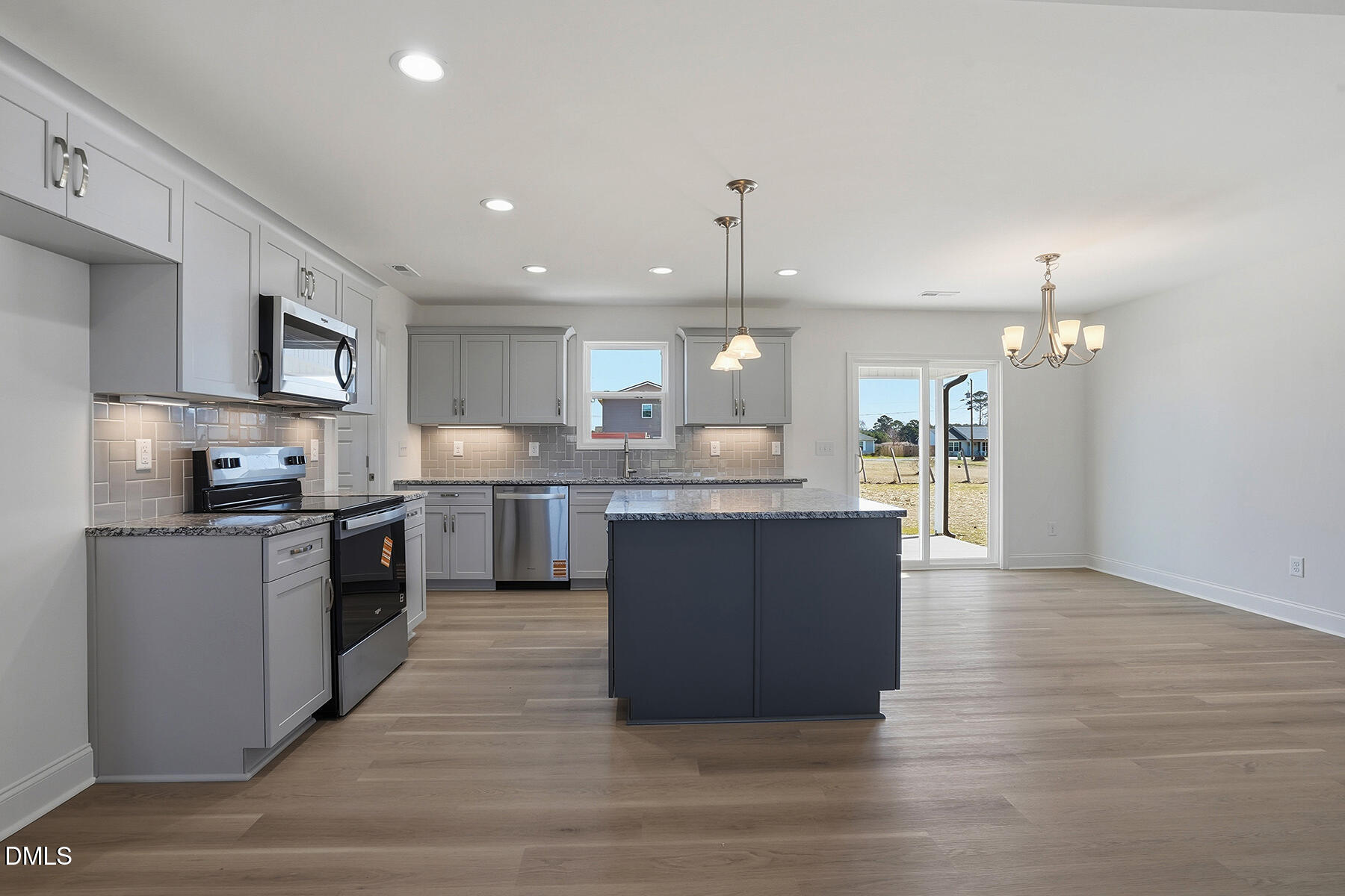 236 Rae Street Warsaw, NC 28398 - Photo 9 of 29 a large kitchen with stainless steel appliances granite countertop a large counter top and a sink